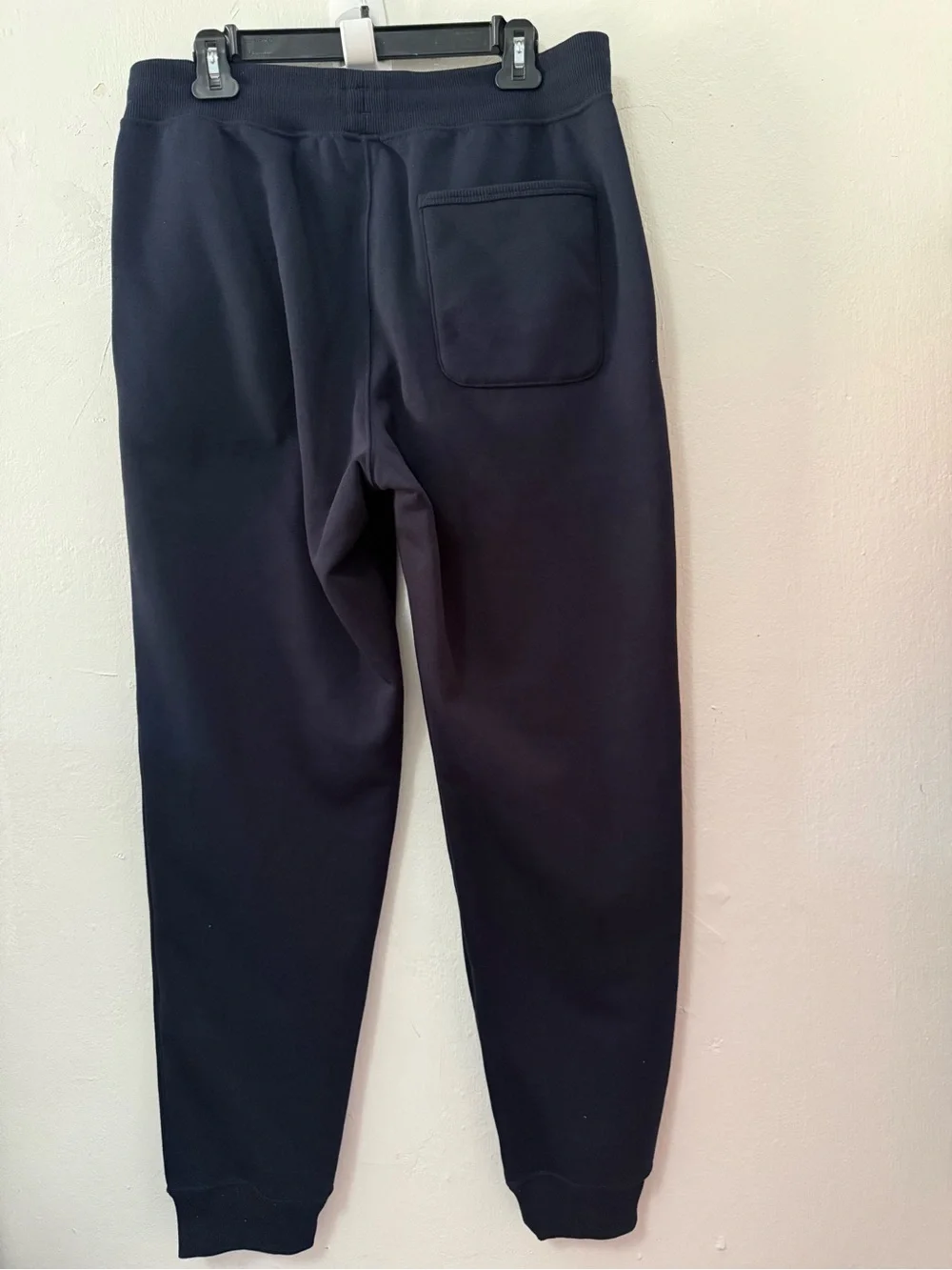 Navy blue UNIQLO Heattech pile lined sweatpants in size L. NWT